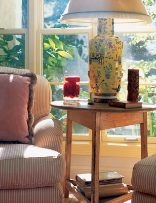 Casey’s country-eclectic living room is comfortable and welcoming.